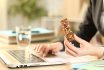 Entrepreneur Hands Holding Snack Bar Working On Laptop