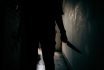 The Shadow Of A Female Murderer Stood Terrifyingly Holding A Knife And Lit From Behind.scary Horror Or Thriller Movie Mood Or Nightmare At Night Murder Or Homicide Concept.