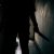 The Shadow Of A Female Murderer Stood Terrifyingly Holding A Knife And Lit From Behind.scary Horror Or Thriller Movie Mood Or Nightmare At Night Murder Or Homicide Concept.