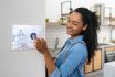 Woman Locking Her House Using A Smart Security System