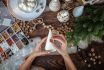 Young Beautiful Woman Wrapping A Foam Cone With String Yarn And Crafting Christmas Tree