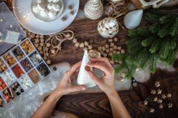 Young Beautiful Woman Wrapping A Foam Cone With String Yarn And Crafting Christmas Tree