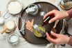 Set For Homemade Natural Eco Soy Wax Candles, Woman Making Decorative Aroma Candle At Table.