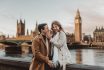 Happy And Young Tourist Couple Enjoying A Romantic Getaway In Iconic Streets Of London City, England, United Kingdom