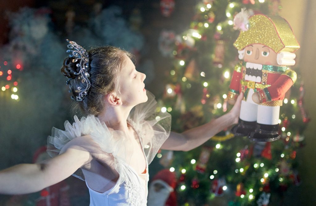 Beautiful Preteen Girl Ballet Dancer Is Holding The Nutcracker On Her Hands