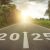 New Year 2025 Or Straightforward Concept. Text 2025 Written On The Road In The Middle Of Asphalt Road At Sunset. Concept Of Planning , Challenge, Business Strategy, Opportunity ,hope, New Life Change.