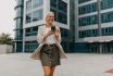 Professional Woman Enjoying Outdoor Phone Time At Office.