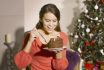 Woman Eating Cake At Christmas