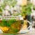 Glass Of Tea On The Wooden Desk In The Garden