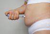 Woman Making Semaglutide Injection Pen In Her Stomach. Semaglutide Injection Diabetes Drug Being Used For Weight Loss.