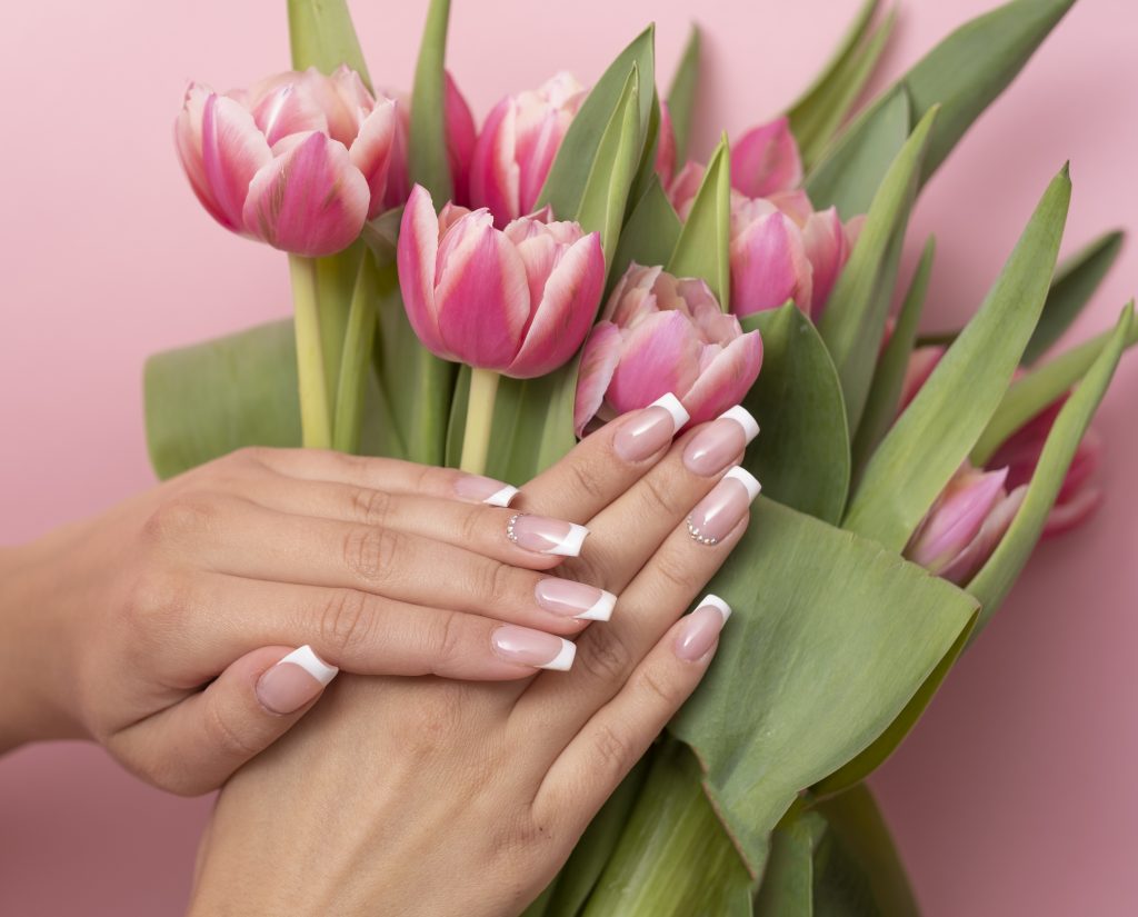 Beautiful Female Hands With Spring Manicure Nails.