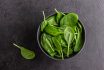 Fresh Green Spinach Leaves In The Bowl. Natural Vegetarian Food.