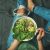 Vegetarian Breakfast Bowl With Spinach, Arugula, Avocado, Seeds And Sprouts