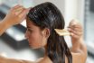 Beautiful Woman Putting Mask On Long Wet Hair. Hairbrushing