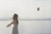 Surreal Woman With Flying Hair Who Is In Perfect Harmony With A Flying Bird, Abstract Concept