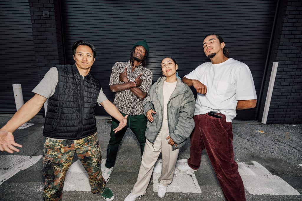 Group Of Street Hip Hop Breakdancers Posing Looking To Camera