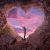 Young Woman In Heart Shape Cave Towards The Beautiful Sky