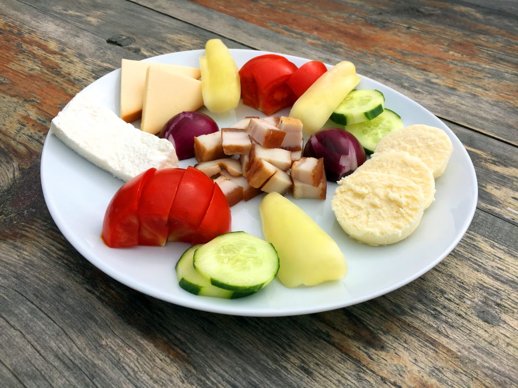 Traditional Cheese Snack On Wooden Table