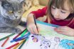 Child With Kitty Drawing At Home