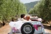 Newlyweds Kissing In Classic Car