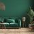 Home Interior Background With Green Sofa, Table And Decor In Living Room