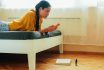 Millennial At Home Using Cbd Oil For Anxiety Before An Exam