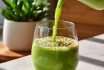 Wow Ai Tf Vibrant Green Smoothie Being Poured Into A Transparen 993ddfe8 C0a7 42b1 9056 F972c461f3f9