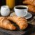 Breakfast With Croissants, Coffee, Orange Juice And Berries