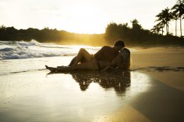 Romantic Young Couple At Sunset