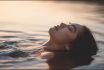 U8145527745 An Asian Woman Floating Calmly On Her Back In A Pea 0b6d0682 4401 4af7 Ae23 E6e437df8f00