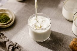 Pouring Fresh Milk In Glass