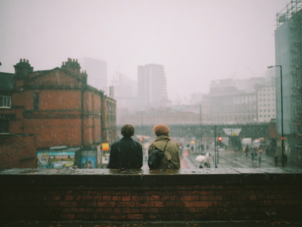 u1637156832 two people sitting looking out over a rainy city 1c22ce9d 4d73 4cde 9364 df65c144e2ac 0
