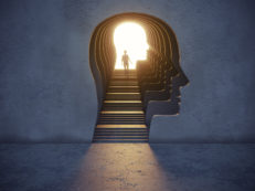 Woman Standing In The Gate Shaped Of Human Head